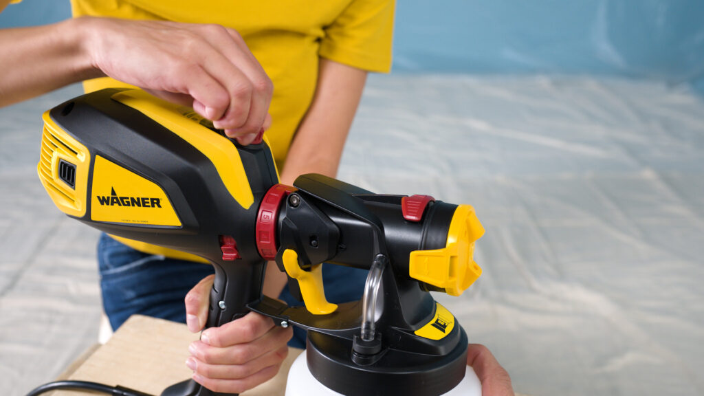 person preparing the flexio 3500 for spraying, textured ceiling setting