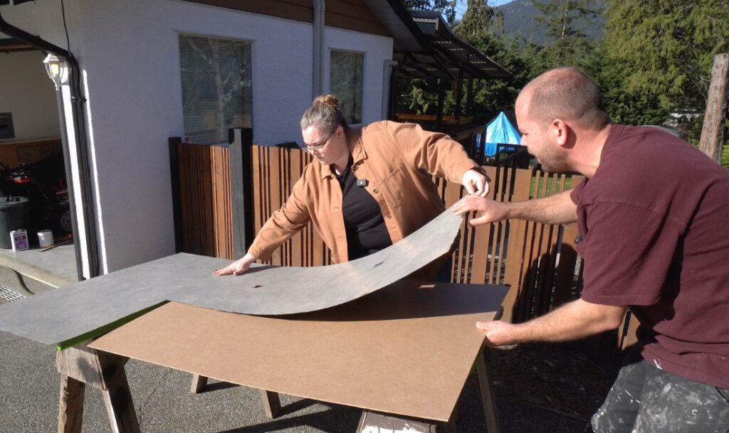 two people creating countertop