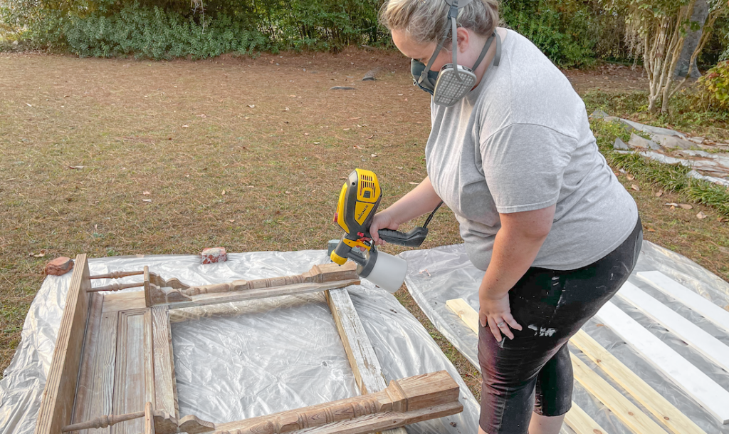 person spraying a mantle with a FLEXiO 3500 paint sprayer