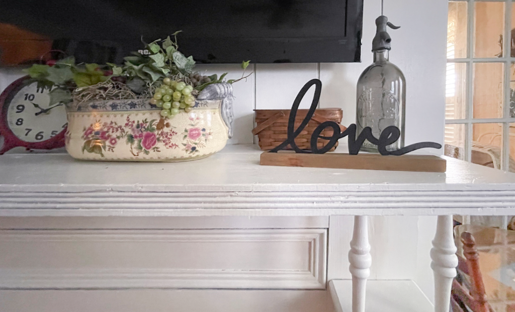 up close photo of mantle with decorations sitting on top