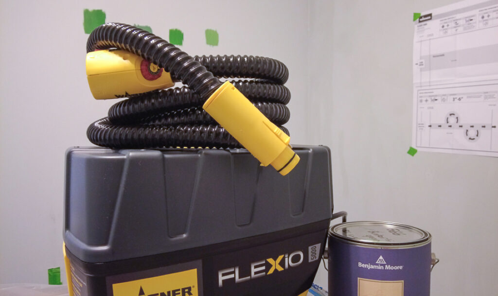 Flexio 5000 with the hose coiled up on top of the stationary part of the unit