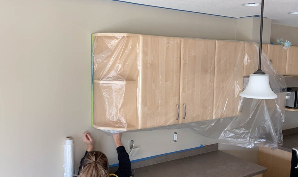 masking kitchen cabinets with tape and plastic