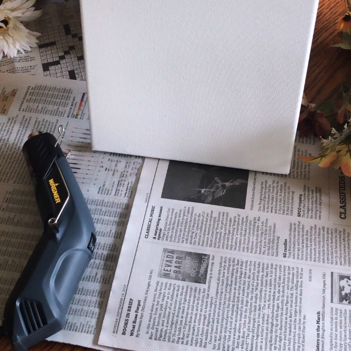 Place newspaper under project