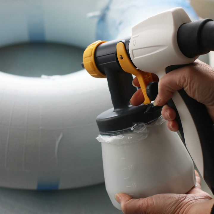 Spray in stages