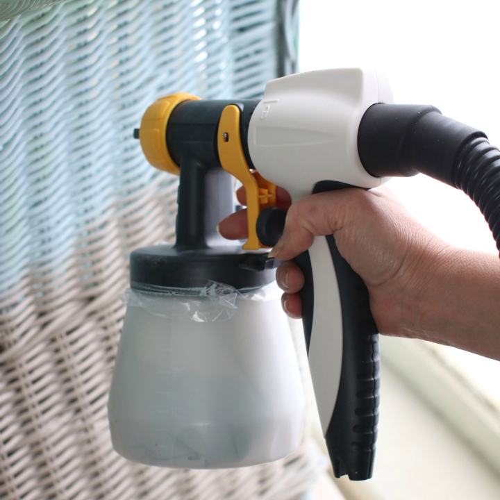 Fill sprayer with paint