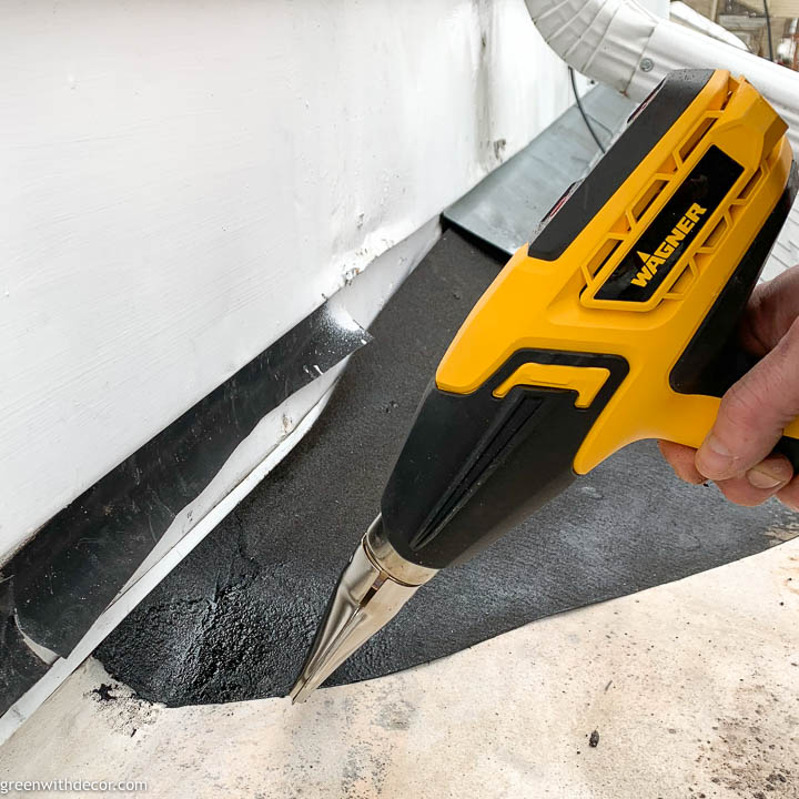 Heat tar paper until adhesive is sticky