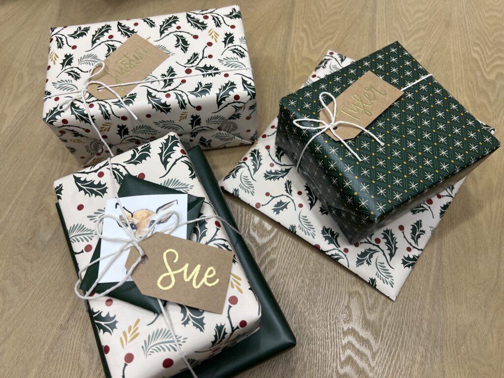 Gifts wrapped with embossed gift tags