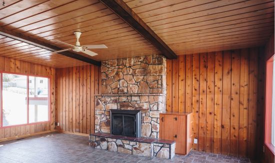 Before image of unpainted wood ceiling