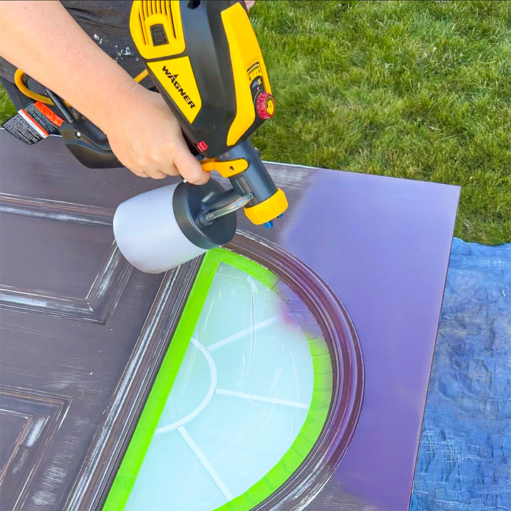 WAGNER painting the door